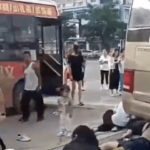 A school bus ploughed into a crowd of people outside a middle school in eastern China on Tuesday, killing 11 parents and students, state media reported.